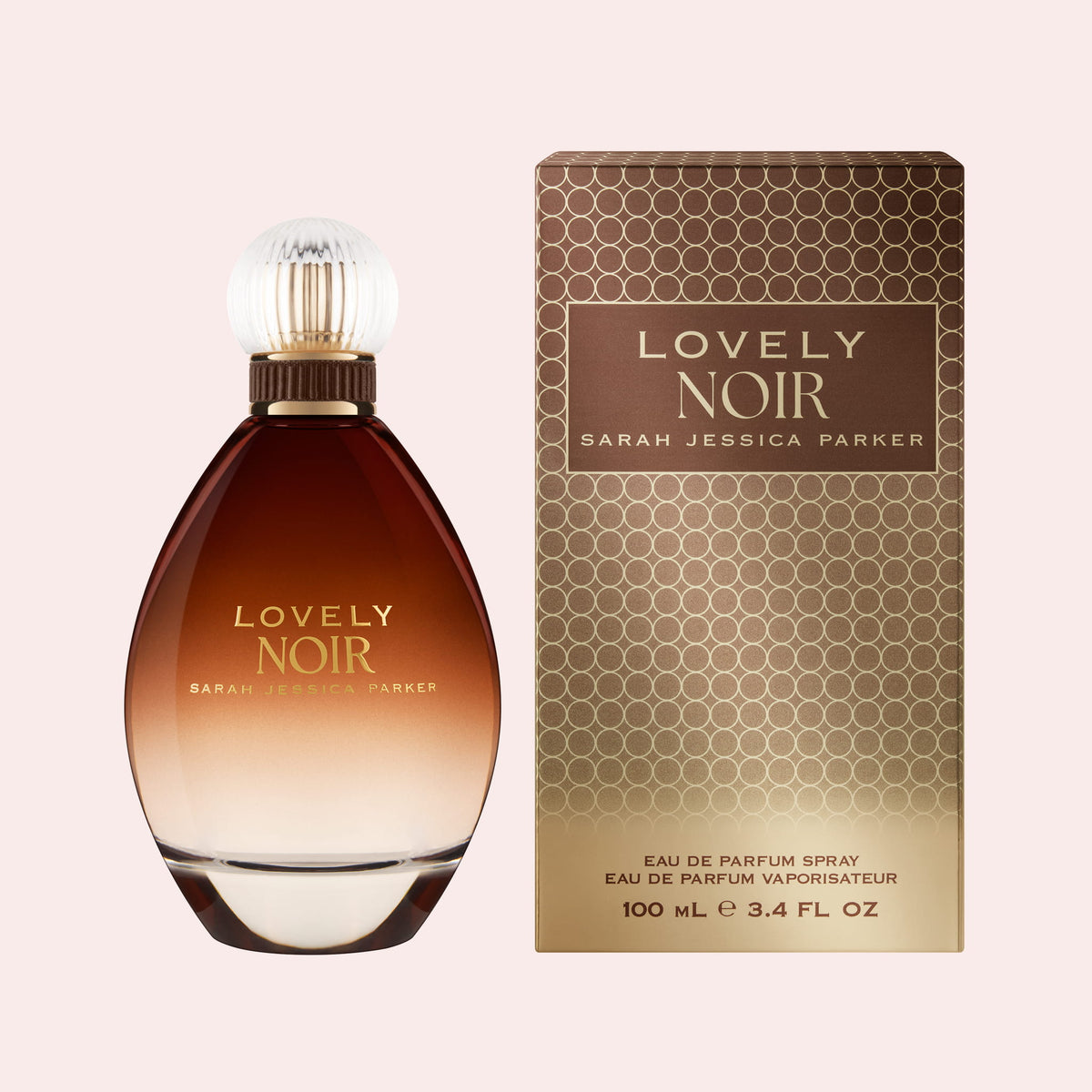 Sarah Jessica Parker Lovely Noir eau de parfum bottle and perfume box on a pink background