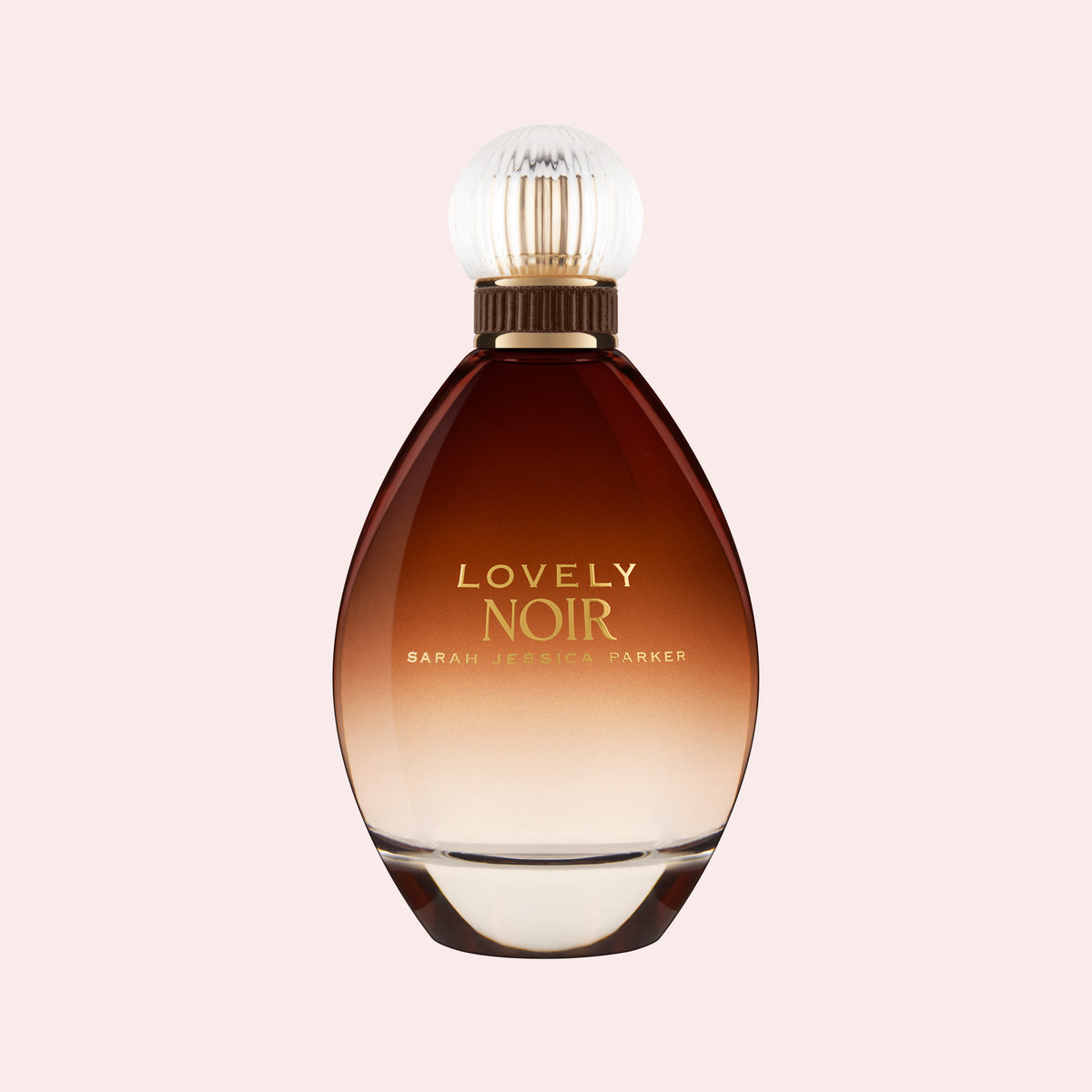 Sarah Jessica Parker Lovely Noir eau de parfum bottle on a pink background